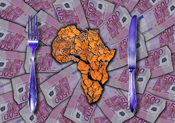 Hunger_in_Afrika_m._Banknoten__quer_.jpg  